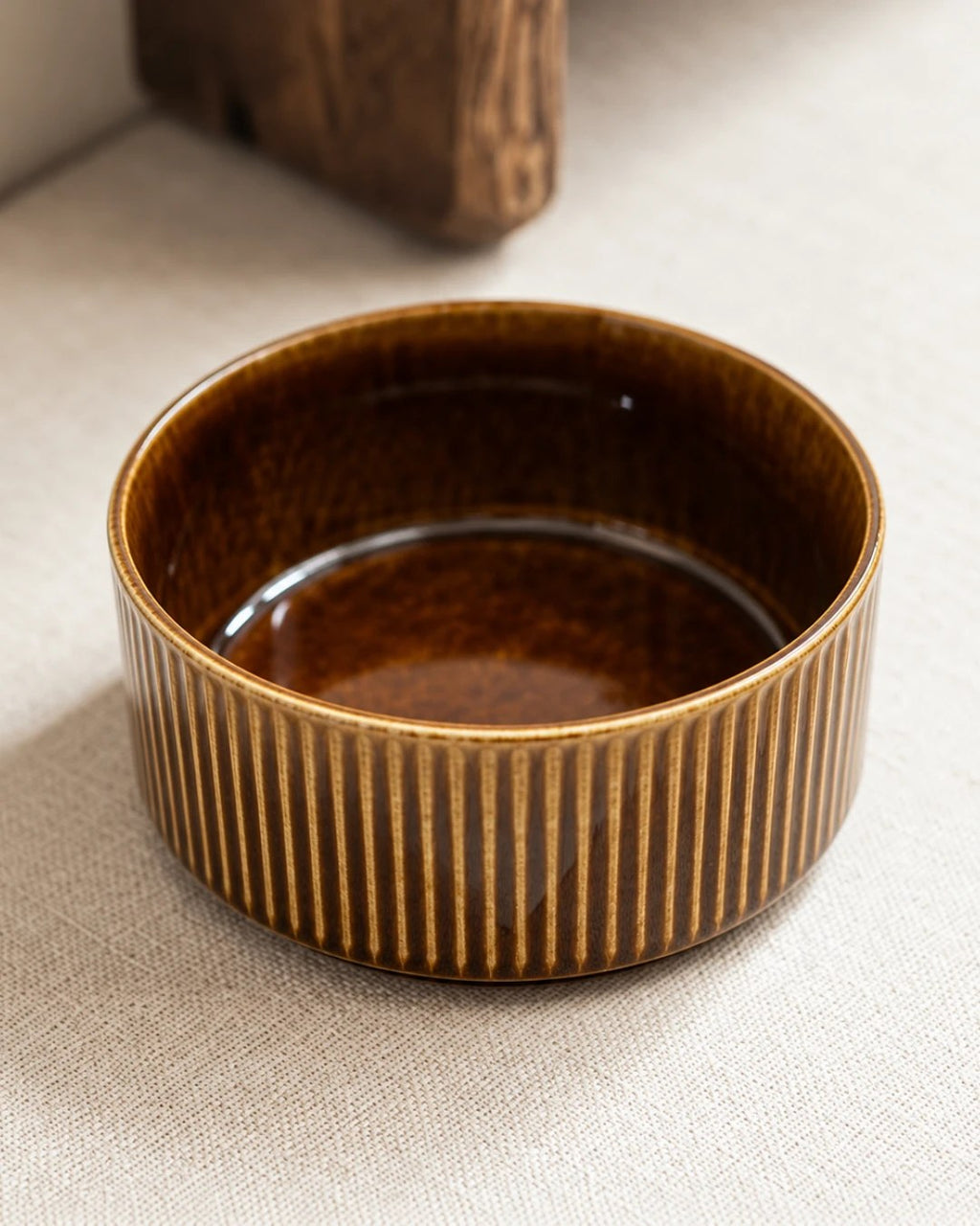 Brown ceramic dog bowl