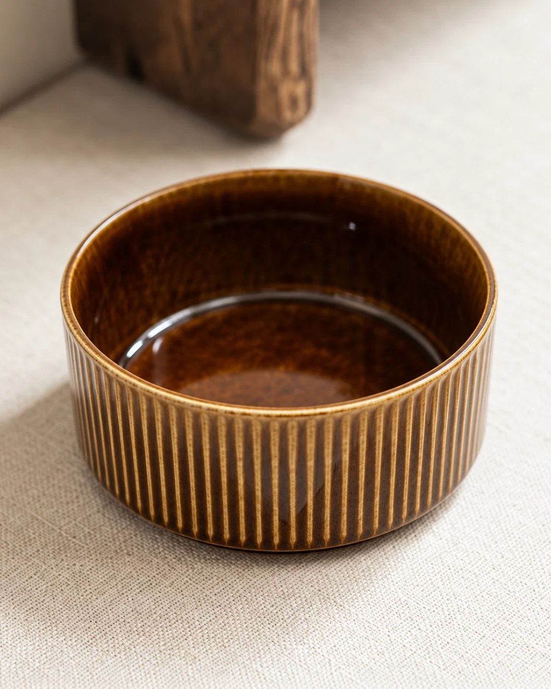 Brown ceramic dog bowl