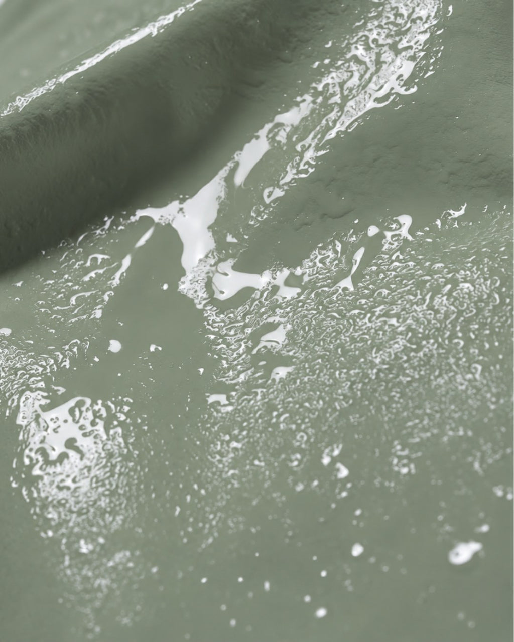 Close-up of the khaki raincoat fabric