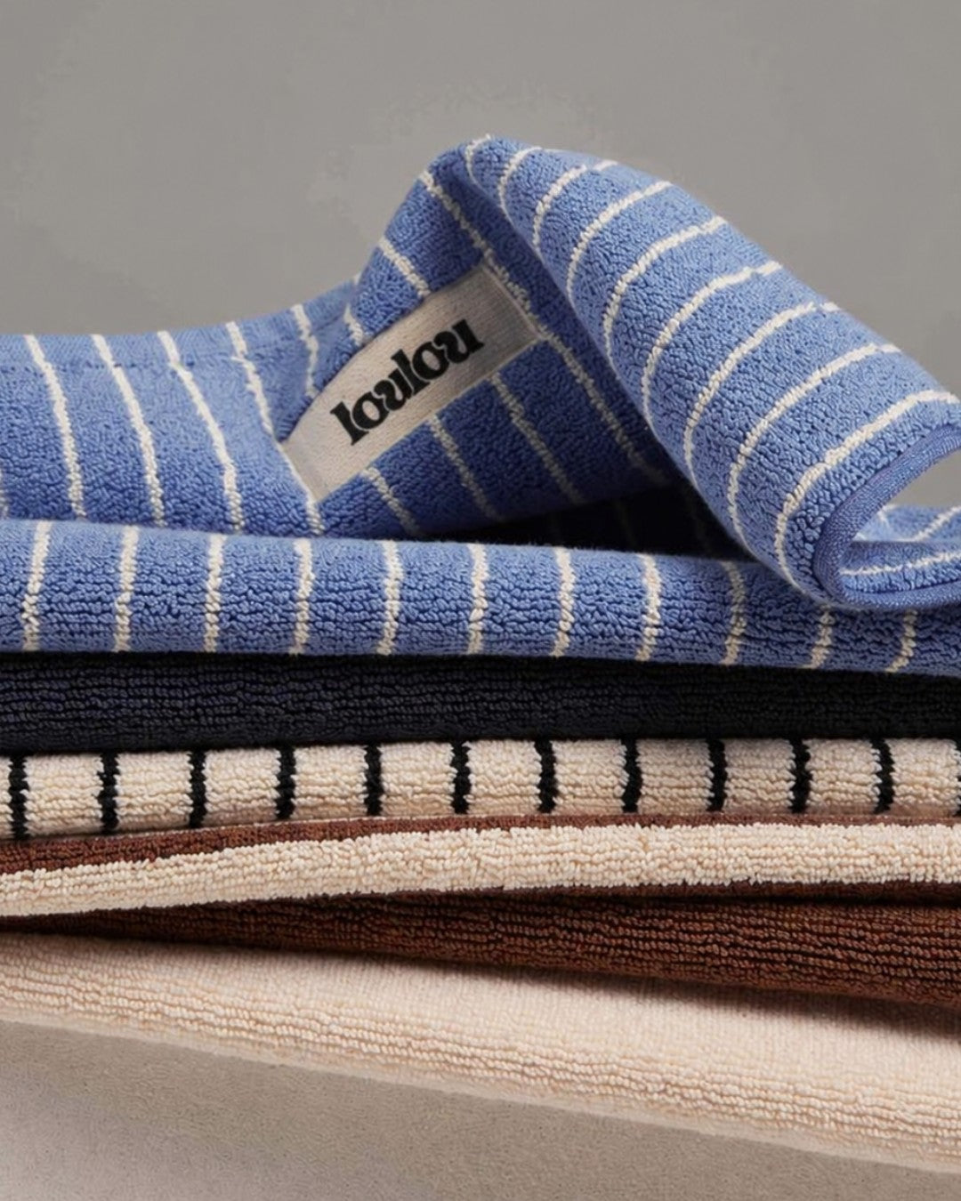 Stack of LOULOU dog towels