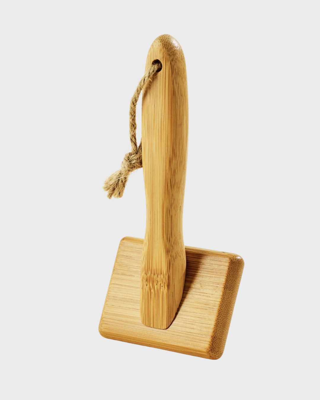 Back of the small bamboo slicker brush